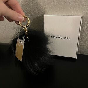 Michaell kors pom Pom